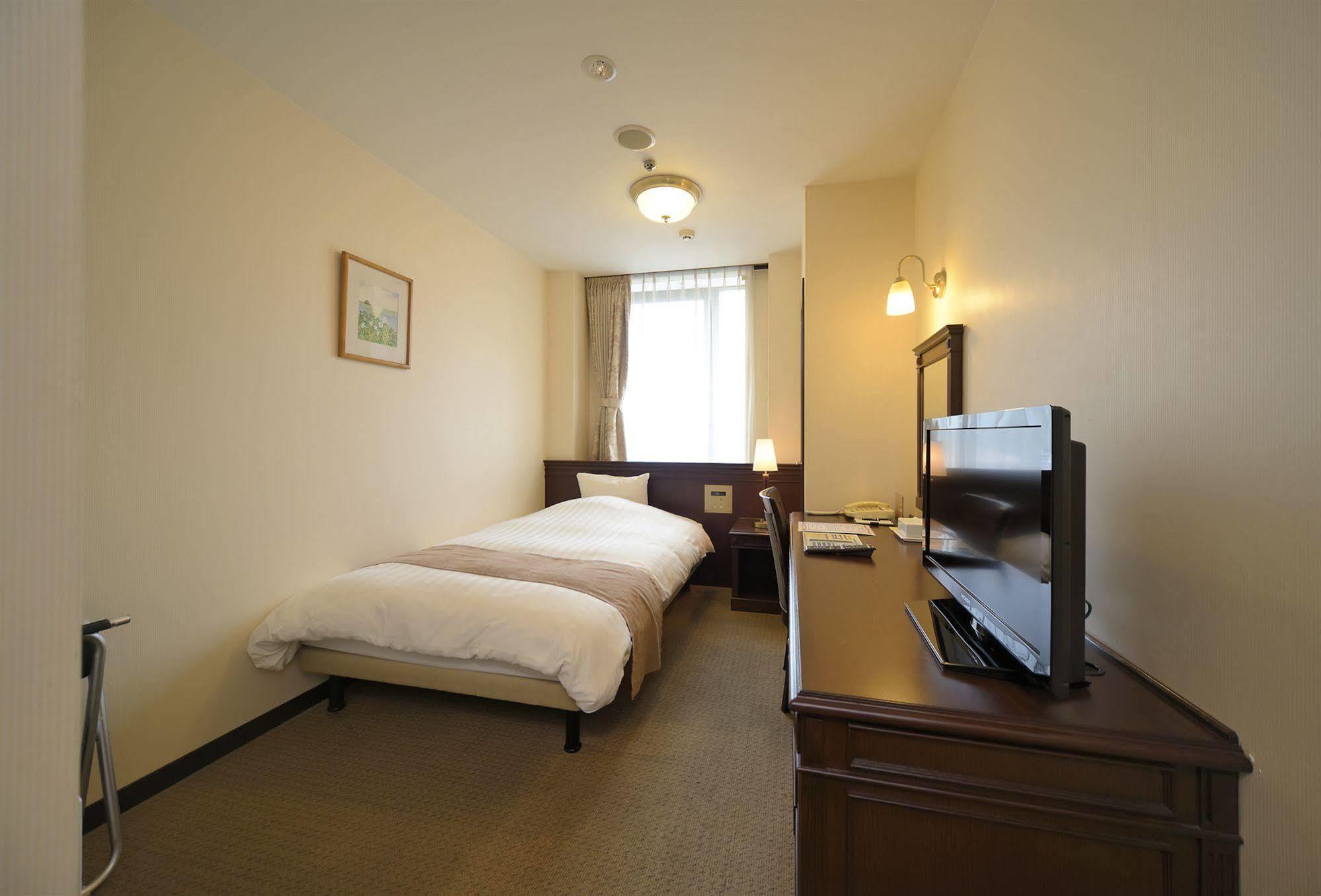 Amami Sunplaza Hotel Exterior photo